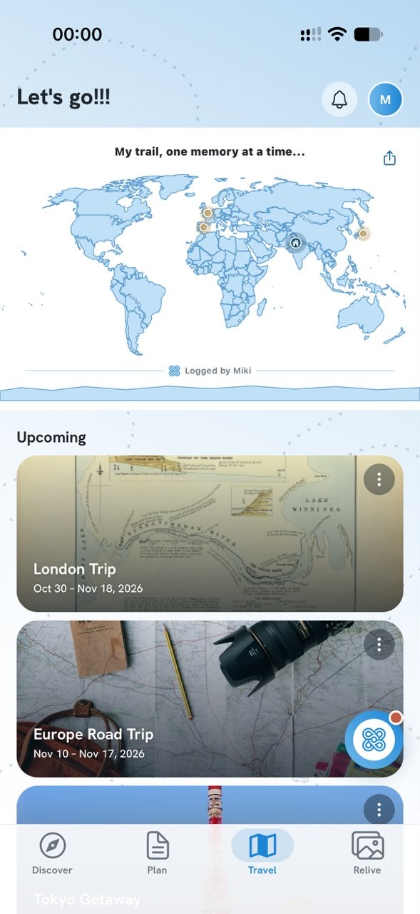 Miki's Travel screen with a world map of trips and upcoming trips